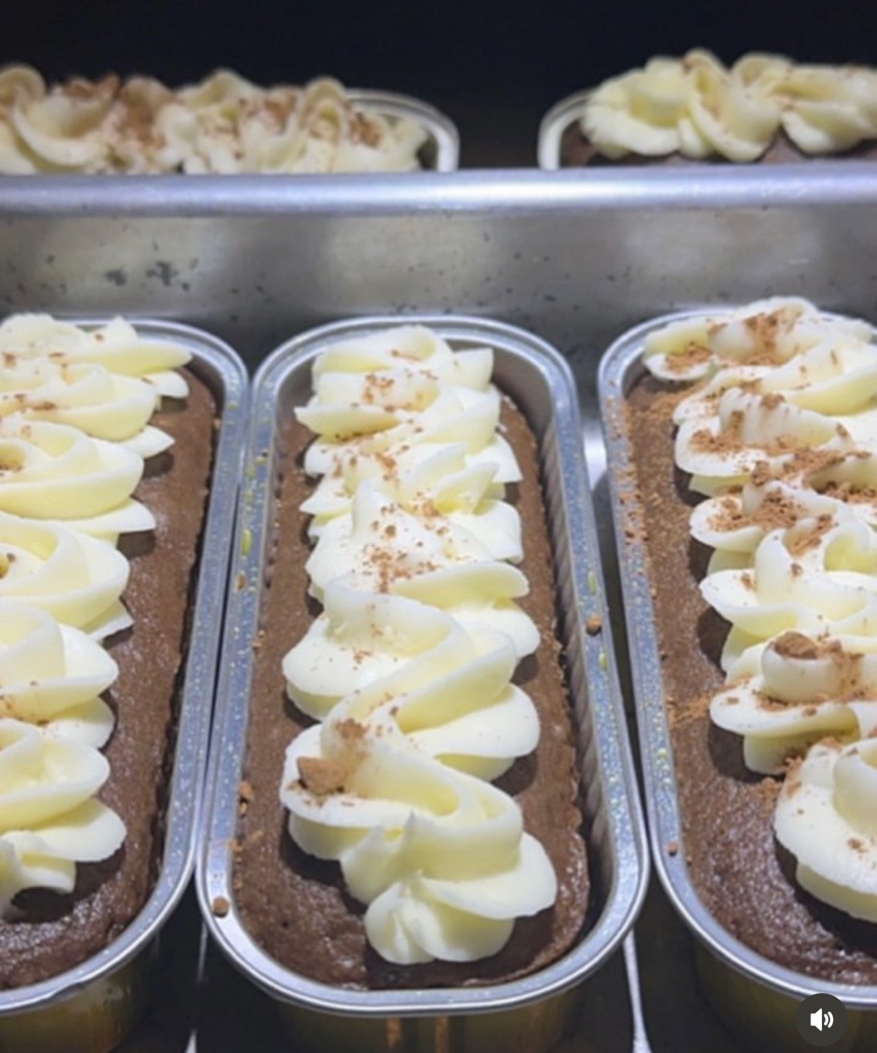 Mini chocolate cakes with piped frosting